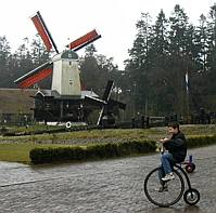 Riding a big wheel bicycle in Holland