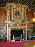 A grand fireplace in the dining room