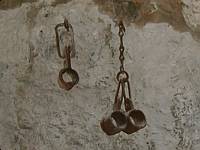 Shackles left by penitents.