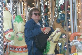 Mom enjoying the merry-go-round
