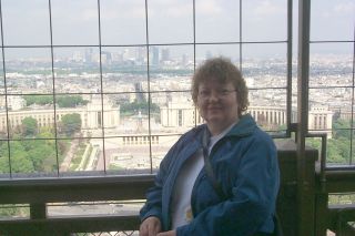Mom on the tower, overlooking the Trocodero