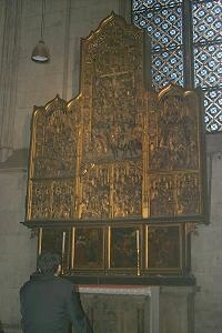 Intricately carved details cover this cabinet