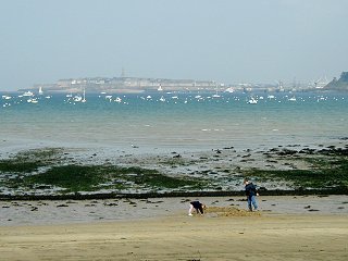 Playing in the sand across from a pirate stronghold